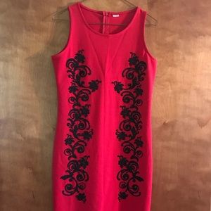 Red dress with beaded design.